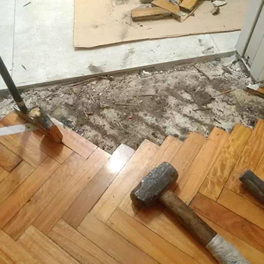 Reparación de entrada a cocina y piso de madera